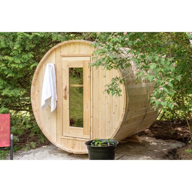Dundalk Leisurecraft 4 person outdoor sauna-harmony in a backyard